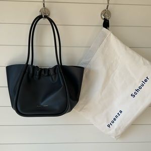 Proenza Schouler Navy (with black pouch) handbag. Retails for $895 at NM.
